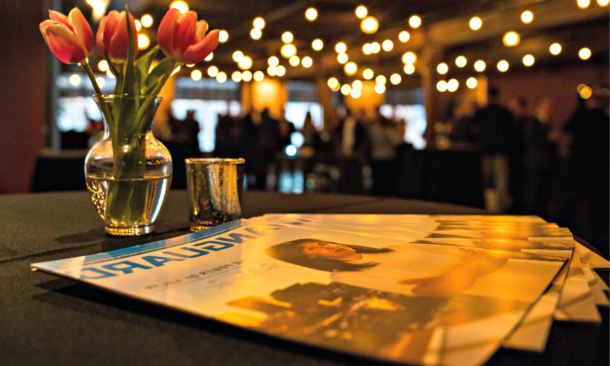 photo of Vanguard magazine on table with flowers